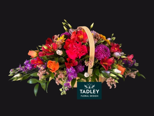 Bright Flowers In Rustic Trug